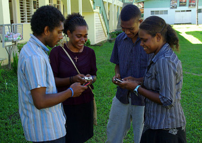 Group_of_young_people_texting_on_mobile_phones._10699648676-400x284.jpg